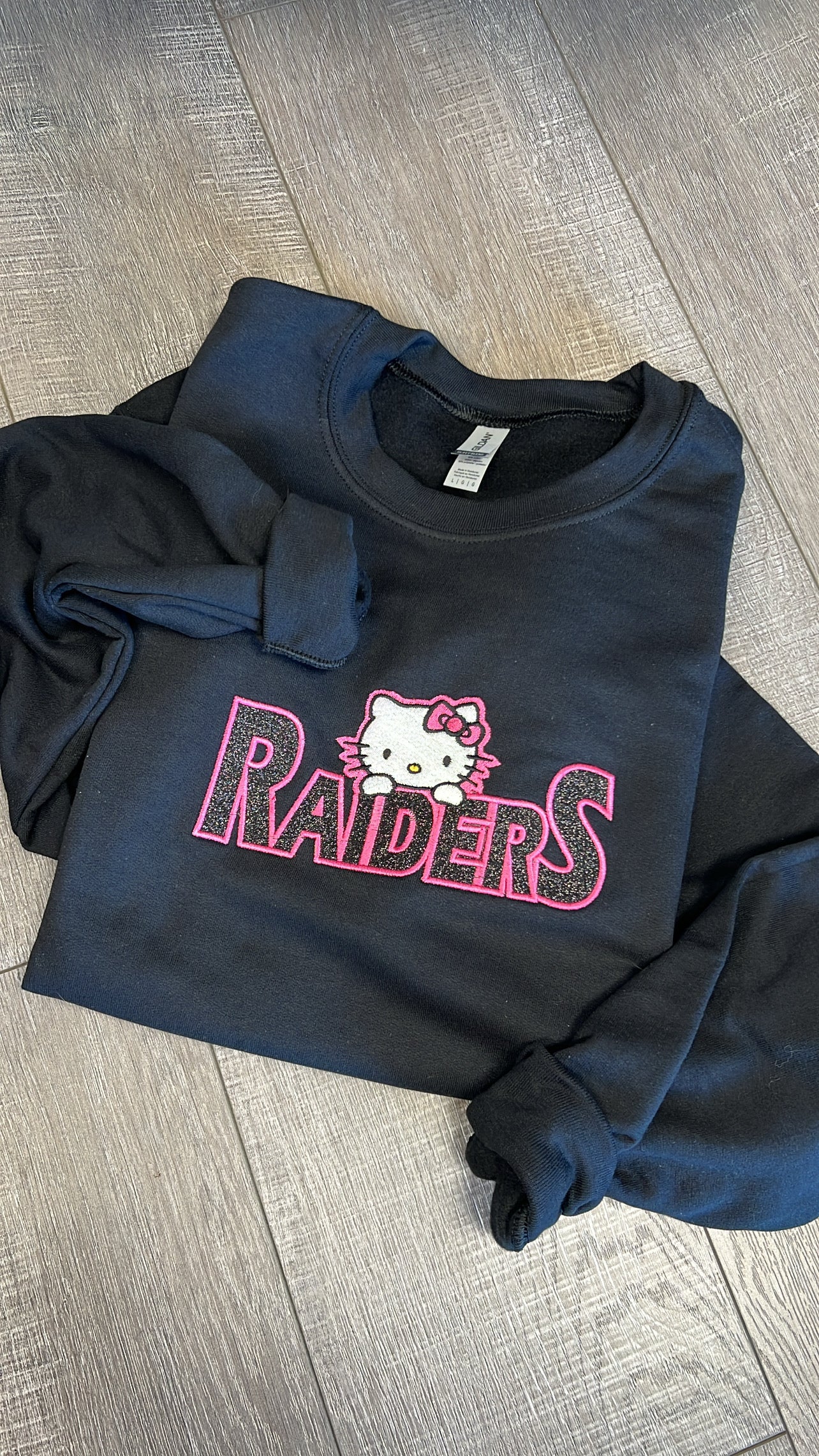 Kitty Raider glitter embroidered crew sweatshirt