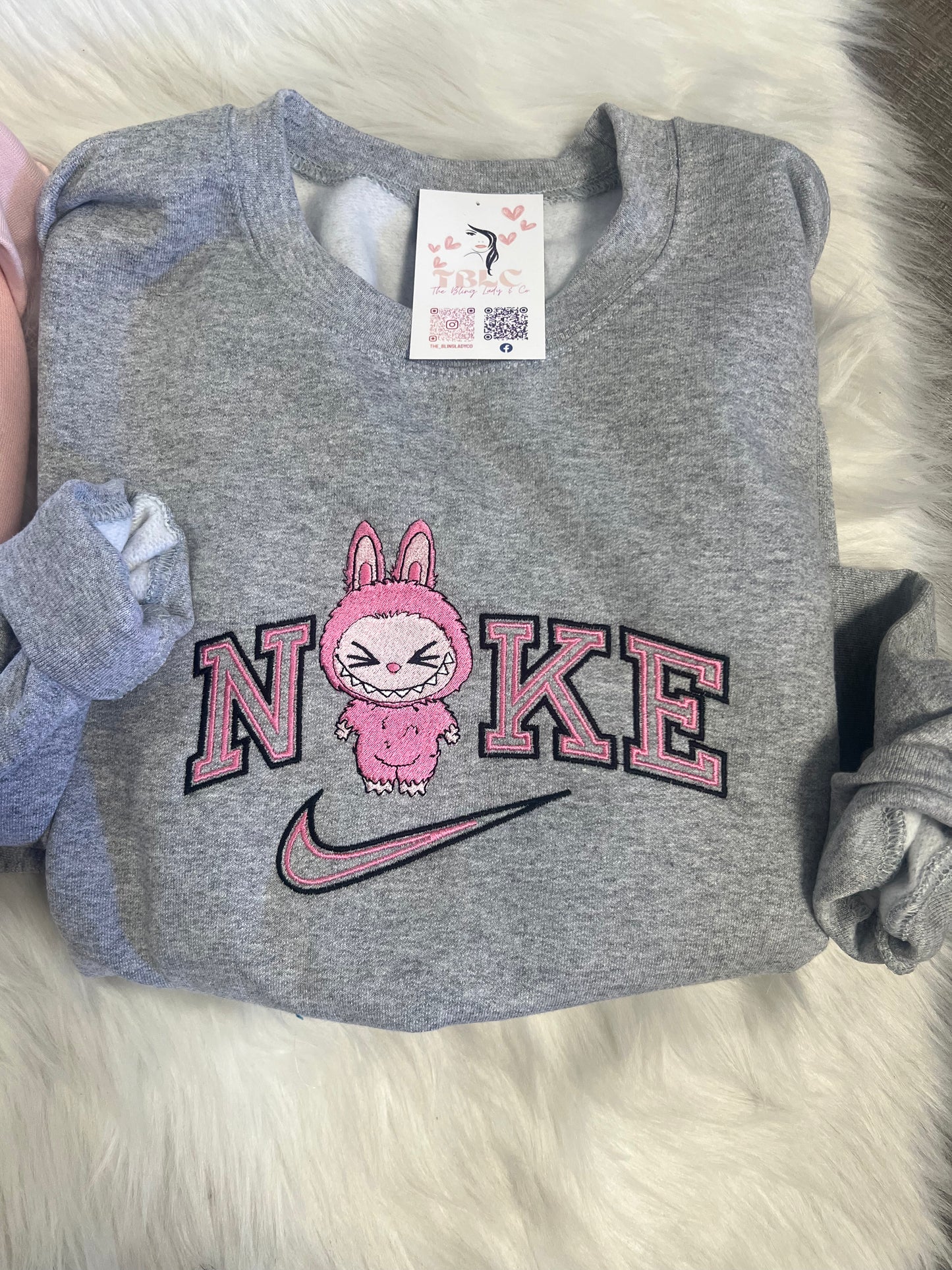 Lil monster swoosh Embroidered sweater